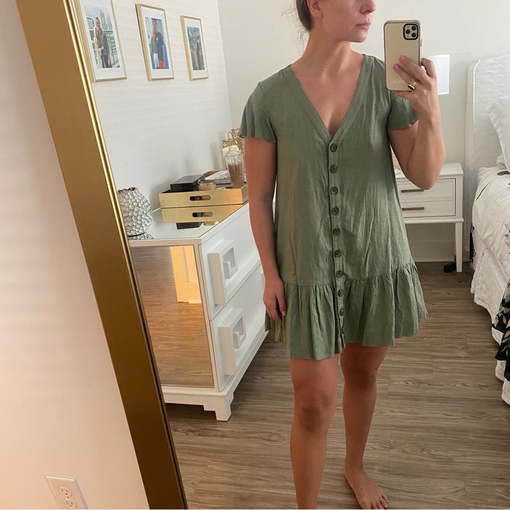 Olive green linen button front ruffle bottom short sleeve mini dress
